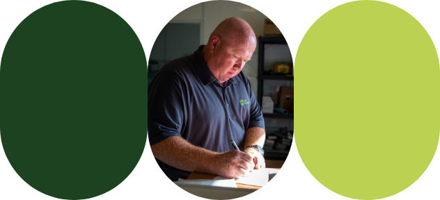 An agri-advisor specialized in poultry production takes notes.